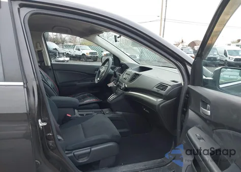 2015 Honda Cr-V Lx z USA, uszkodzony, nr VIN 2HKRM4H31FH621177